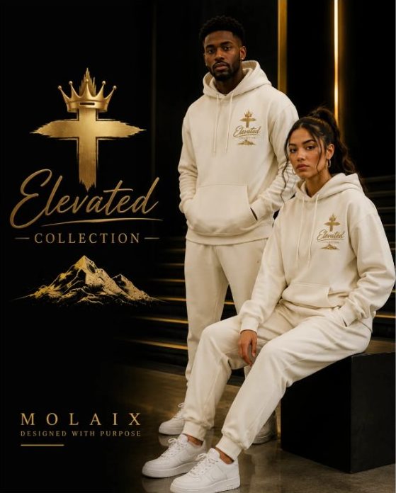 Elevated Collection campaign: two models in cream sweatsuits with a gold cross mark