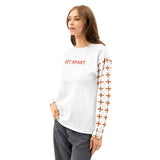 Angled front detail of the Ascension crewneck showing SET APART lettering and cross-patterned sleeves